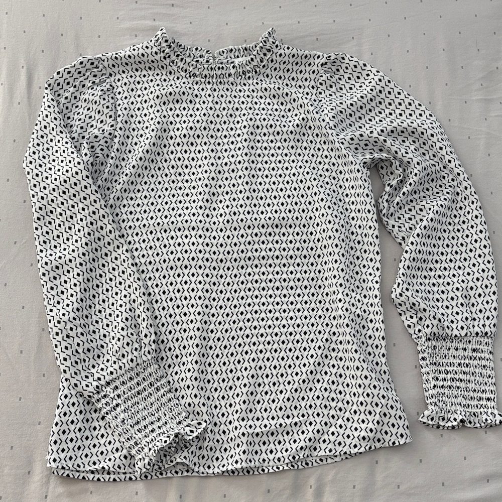 Elegant Black and White Patterned Blouse